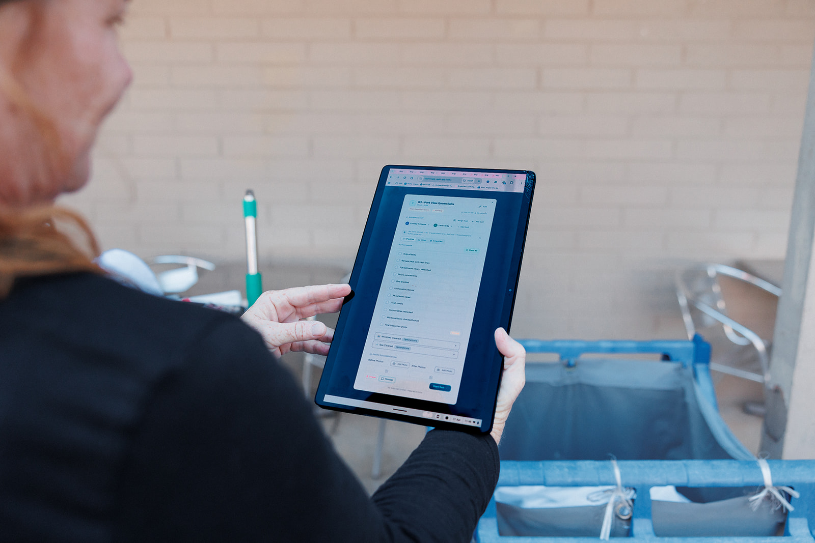 Room Hub running on a tablet mounted to a housekeeping cart, showing a cleaning checklist